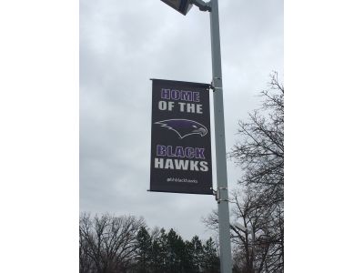 A BannerFlex Banner secured on a light pole